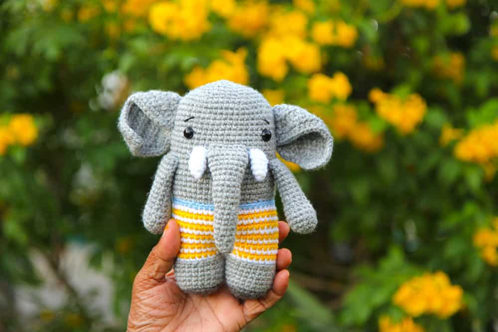 crochet elephant with striped swim shorts