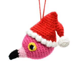 crochet flamingo ornament with a Santa hat