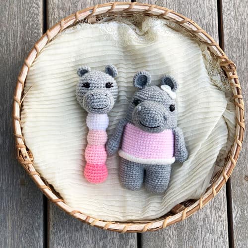 crochet hippo baby rattle with a matching amigurumi hippo toy