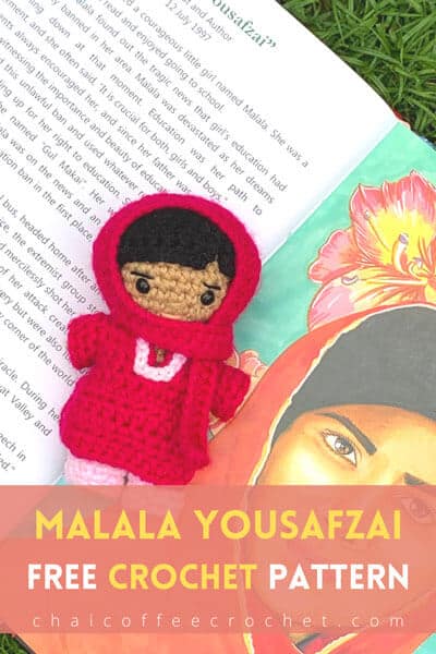 Small crochet malala doll on a book about Malala Yousafzai. Text says "Malala Yousafzai free crochet pattern"