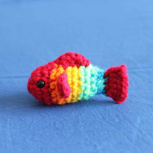 no sew small crochet fish in rainbow colours