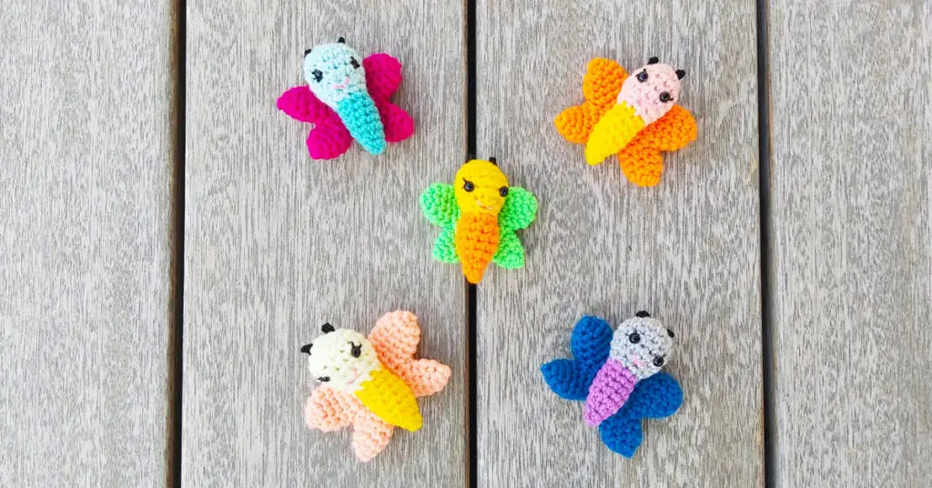 five brightly coloured crochet butterflies