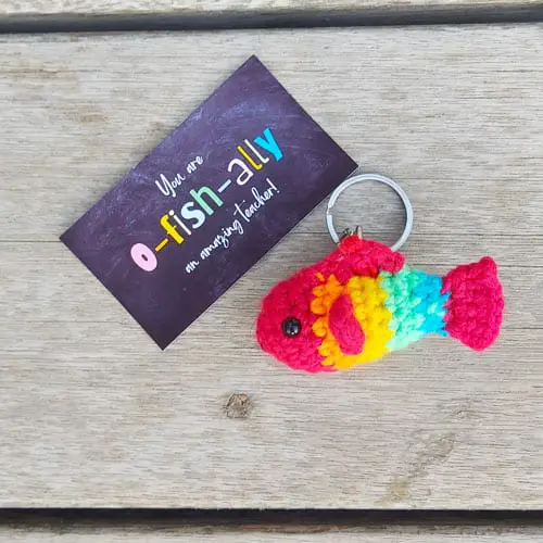 crochet fish keychain with a gift tag saying " you are o-fish-ally an amazing teacher"