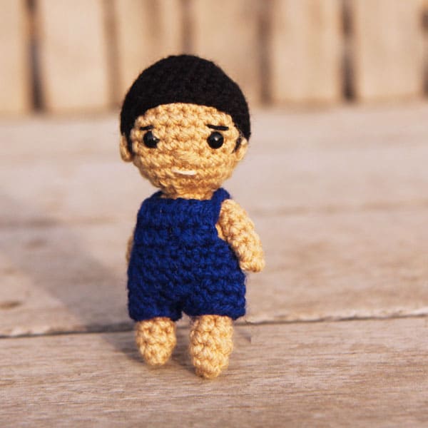 small crochet boy doll with overalls