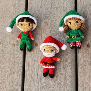 small crochet Santa and two elves