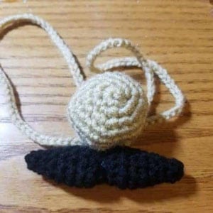 crochet nose warmer with a moustache