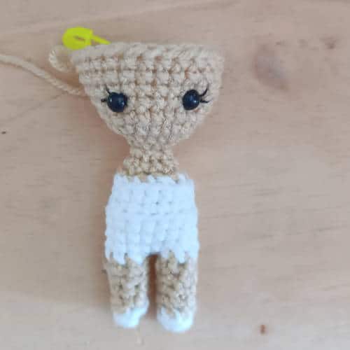 incomplete crochet bride doll with eyelashes and eyes inserted