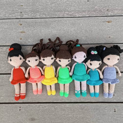 crochet ballerina dolls in rainbow colour dresses with various hairstyles