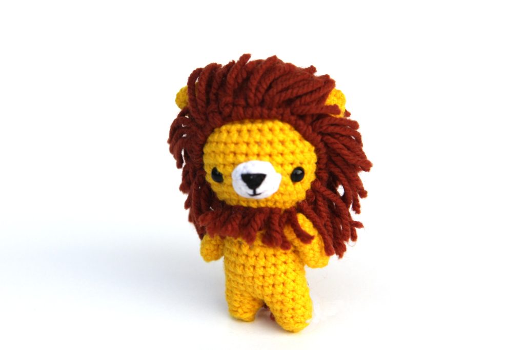 small crochet lion with a shaggy mane