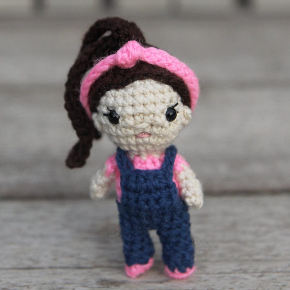 Small crochet Ms. Rachel doll with overalls and a hairband